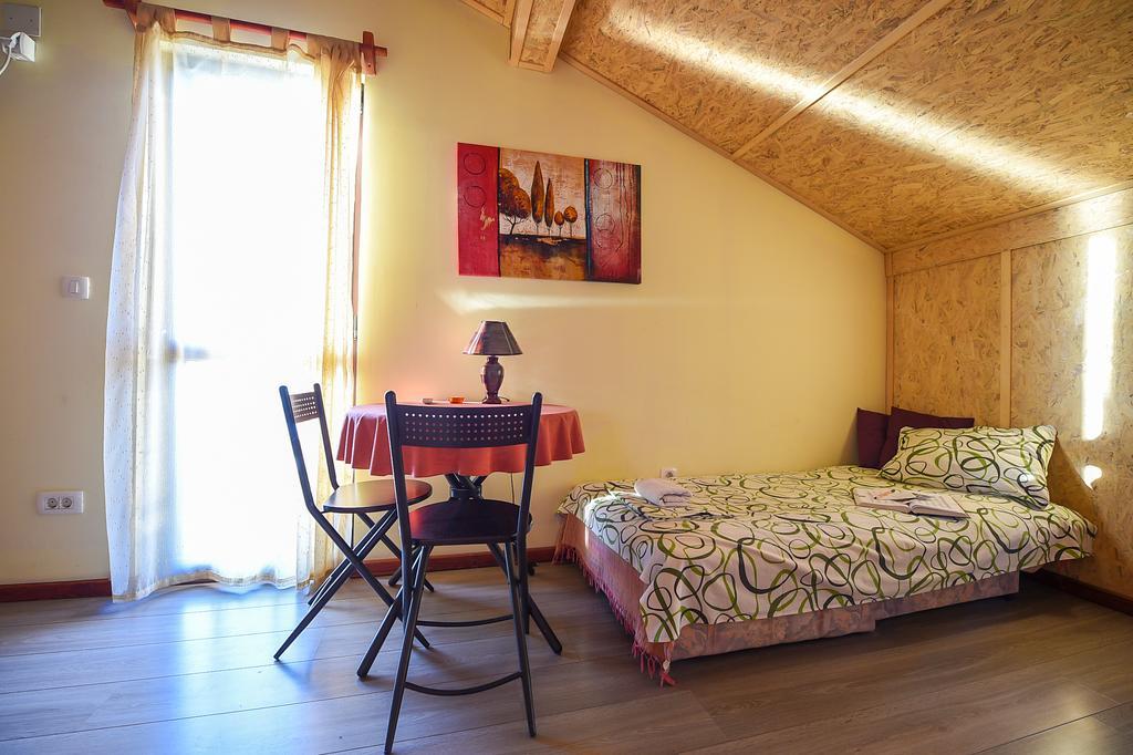 Chambre Triple avec Terrasse